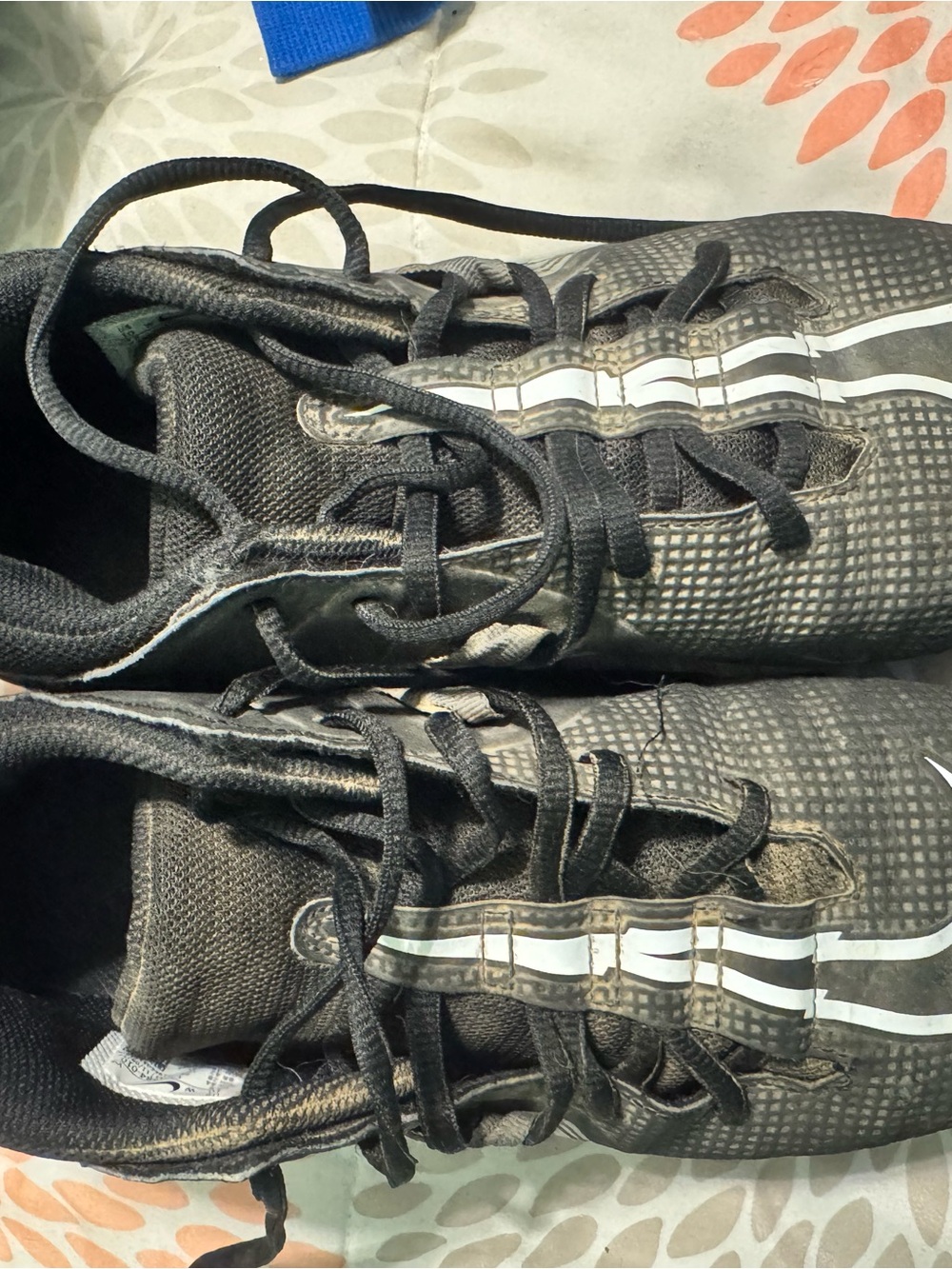 Nike Black Athletic Lace-Up Football Cleats with White Stripe